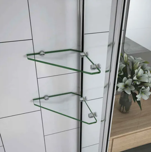 Glass shelf detail on bath shower screen with chrome fittings