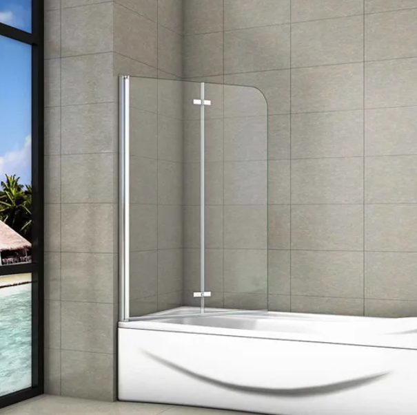Chrome bath shower screen in closed position on modern bathtub