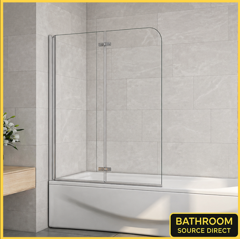 Curved glass bath shower screen with chrome frame fitted on modern bath with tiled walls