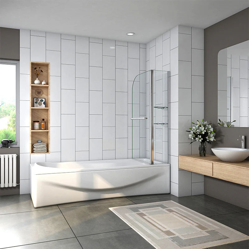 Chrome bath shower screen installed in modern bathroom with bath and shelving