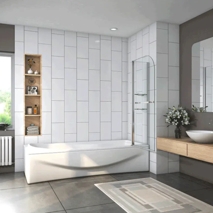 Chrome bath shower screen open position on modern bathtub in tiled bathroom
