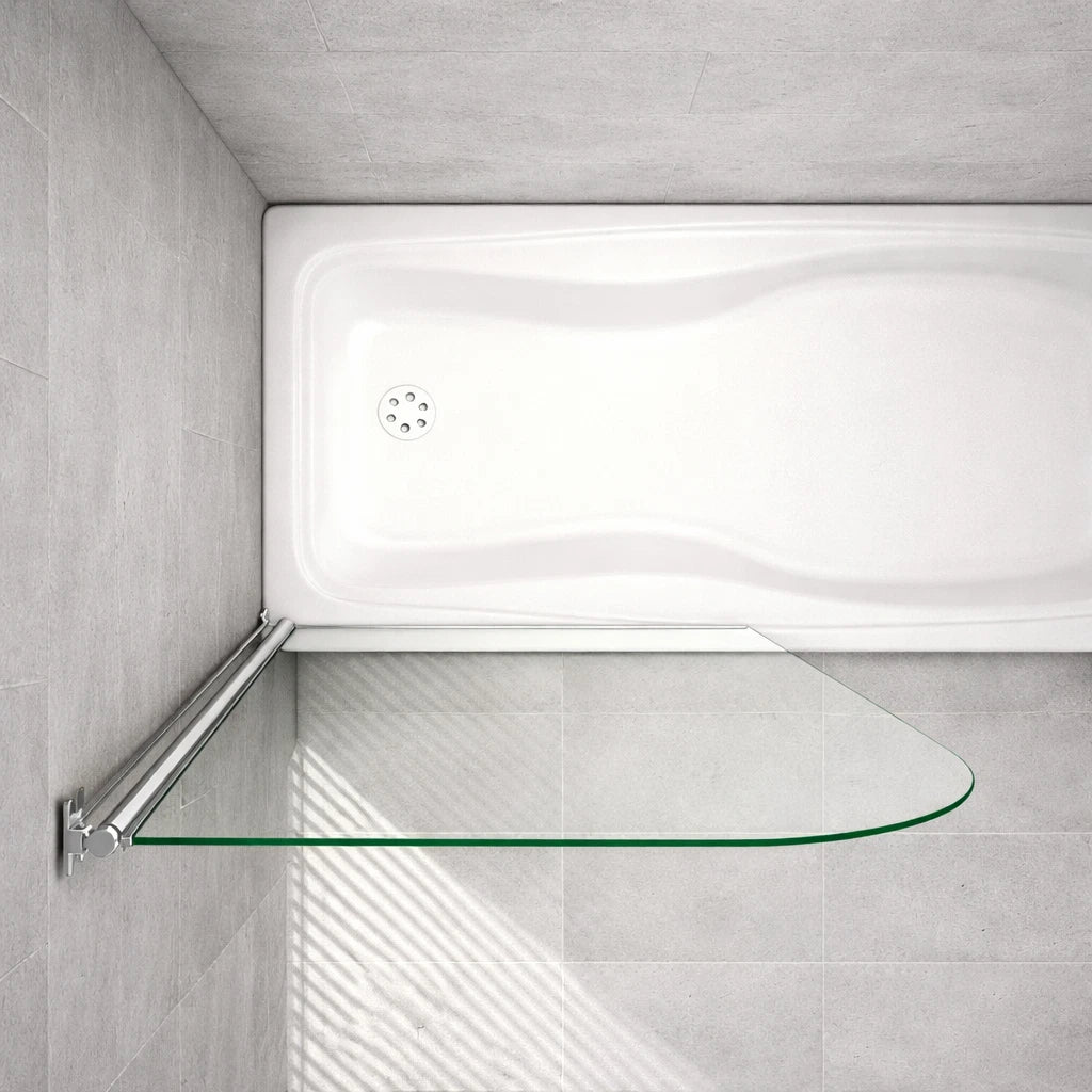Top view of chrome pivot bath shower screen with curved glass panel mounted on a white bathtub showing hinge mechanism and glass shape