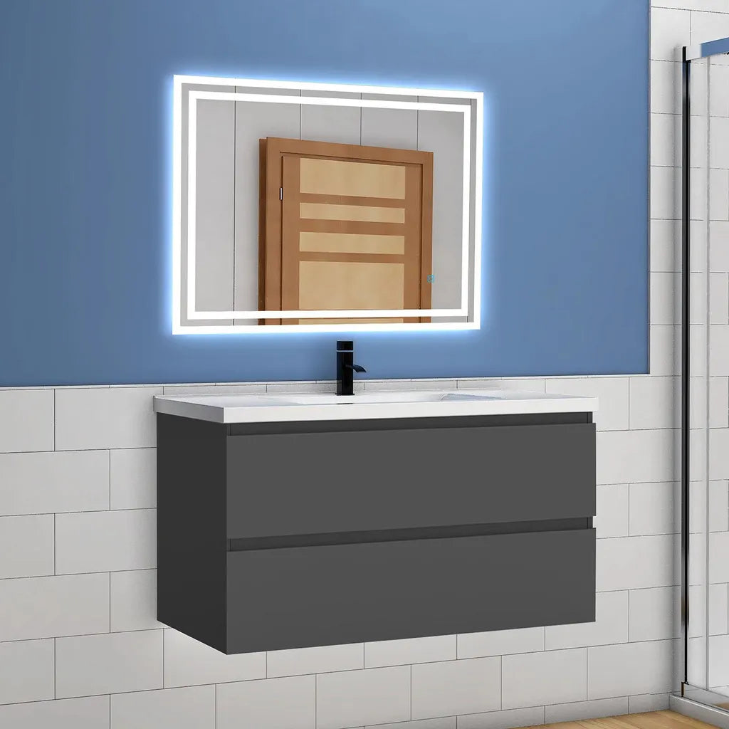 Bathroom vanity with illuminated mirror against a blue wall.