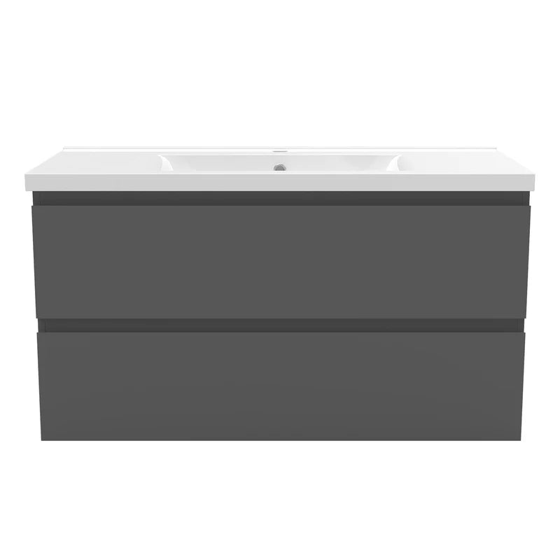 Bathroom vanity with dark gray base and white countertop on a white background