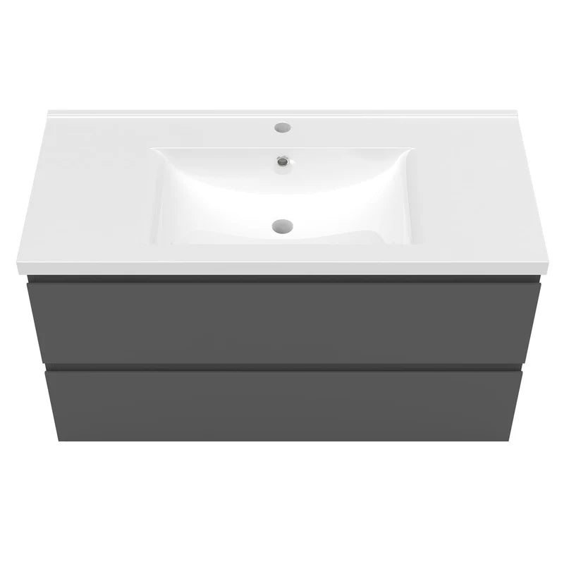 Bathroom vanity with white countertop and gray base on a white background