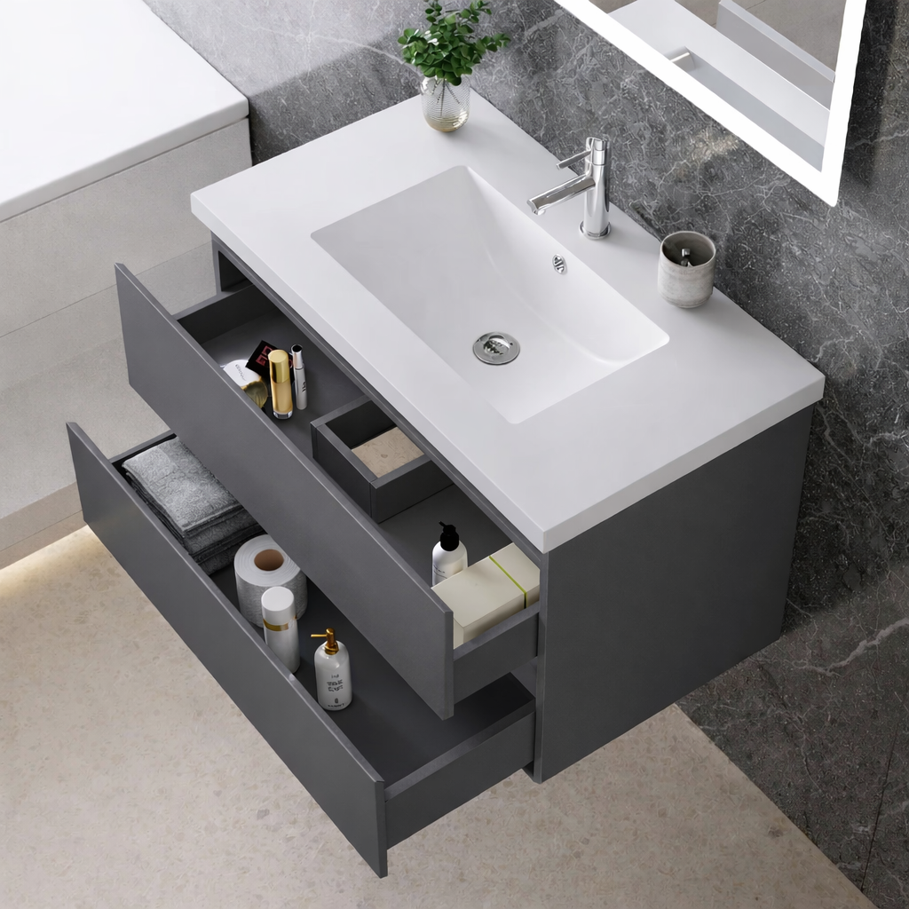 Bathroom vanity with sink and open drawer containing toiletries