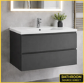 Bathroom vanity with sink and mirror in a modern bathroom setting.