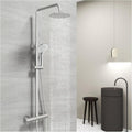 Orin round chrome thermostatic shower riser kit with rainfall head and handset