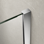 A modern rectangular glass shower or bathroom wall mount with a polished chrome finish, shown attached to a light gray stone tile wall with a glass panel extending to the left.