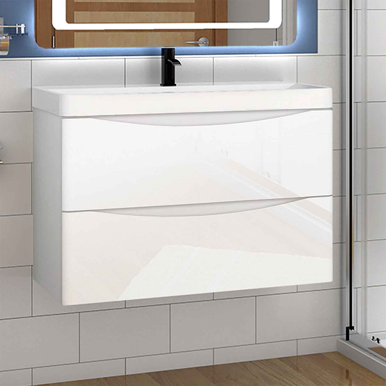 Bathroom vanity with white cabinet, black faucet, and illuminated mirror.