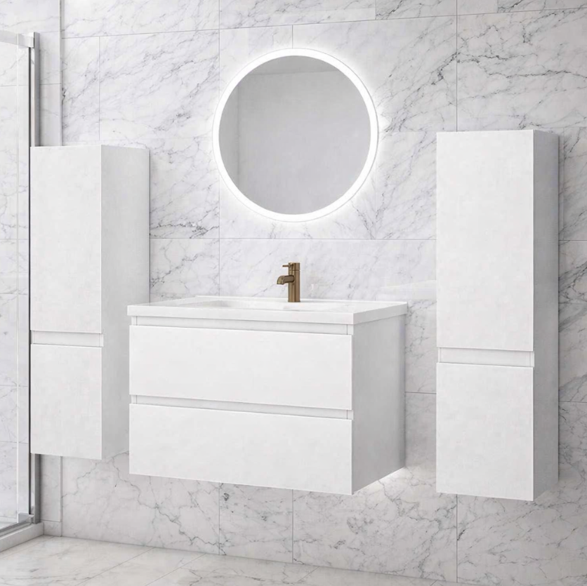 White vanity unit with round LED mirror in modern bathroom setting