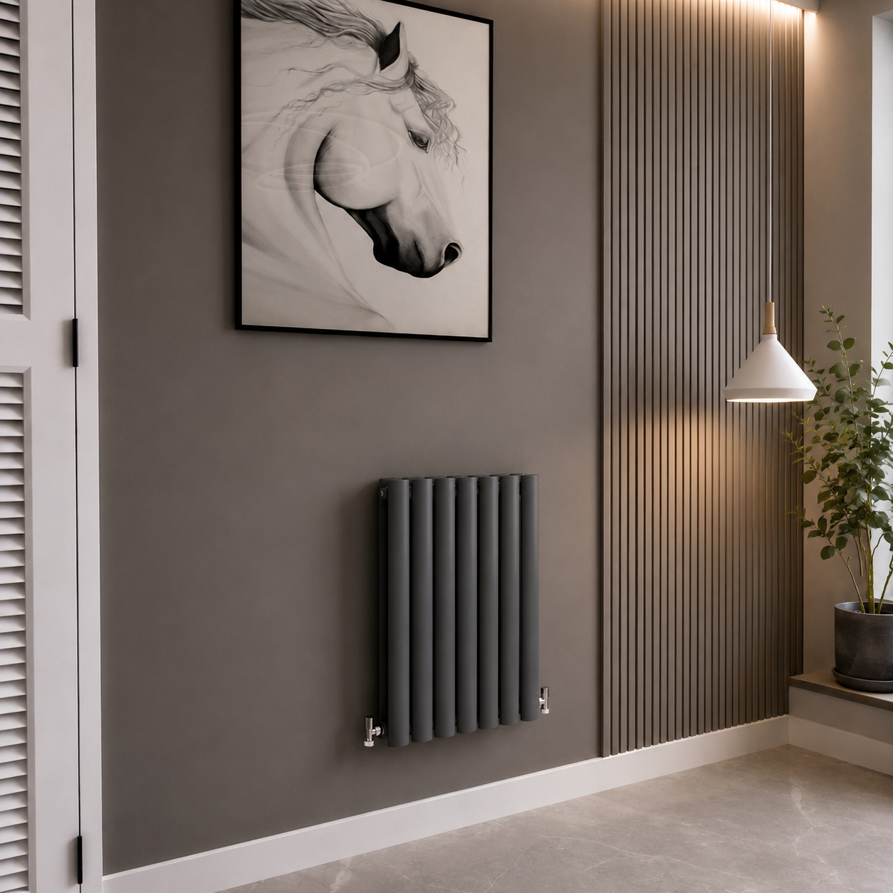 Anthracite vertical oval column radiator in modern interior room with feature wall and contemporary styling.