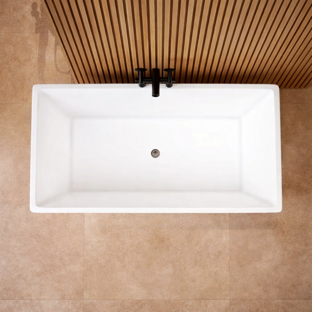 Top view of square freestanding double ended bath showing spacious internal design and central waste