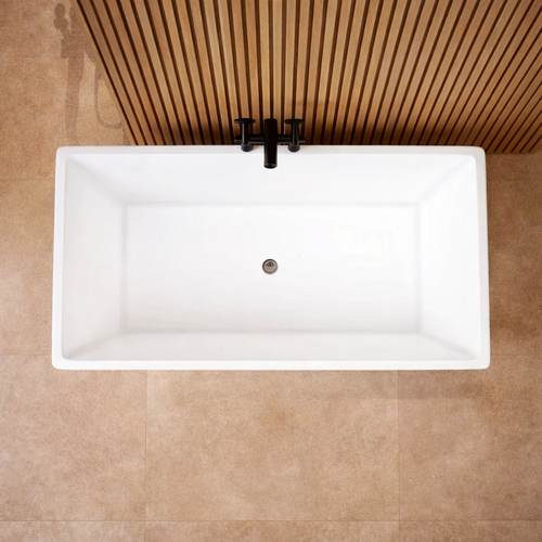 Top view of square freestanding double ended bath showing spacious internal design and central waste