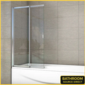 Bath Shower Screen With Clear Glass And Chrome Frame Installed Over Bath In Modern Grey Tiled Bathroom