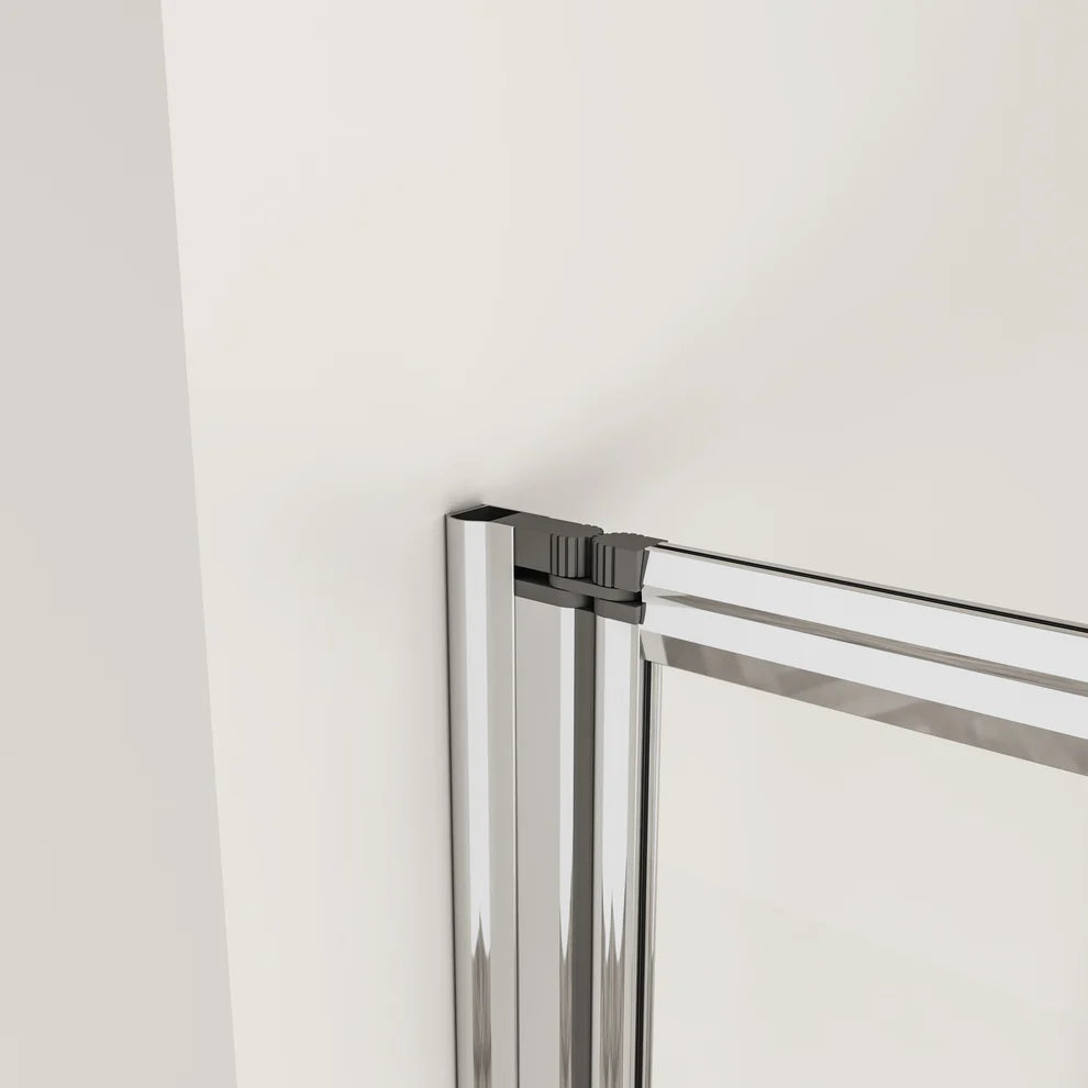 Close Up Of Glass Hinge And Chrome Fittings On Bath Shower Screen