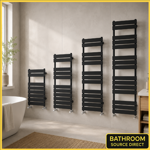 Set of black flat panel heated towel rail radiators in modern bathroom setting available in multiple heights from Bathroom Source Direct.