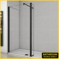 Black Framed Walk In Shower Screen With Side Return Panel Installed In Modern Grey Bathroom