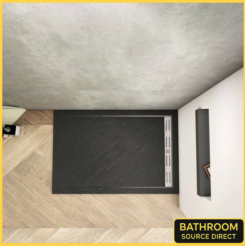 Black slate effect shower tray 1400mm with linear waste in modern bathroom setting