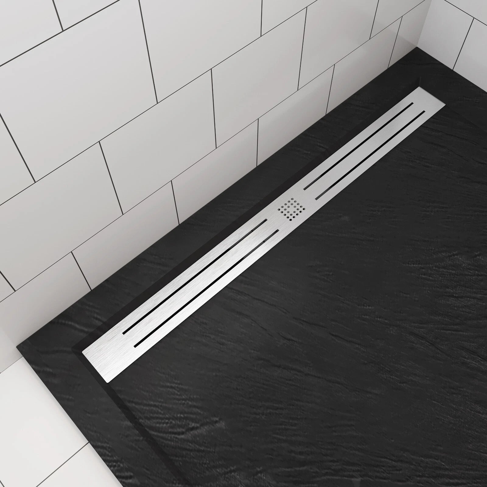 Top view of black slate effect stone resin shower tray with linear waste channel