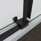 Close Up Of Bottom Roller Track On Black Sliding Shower Door