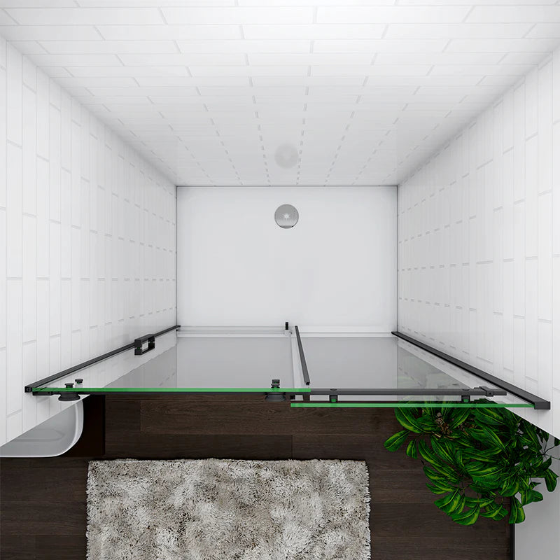 Black Sliding Shower Door Overhead Angle View Showing Sliding Rail And Glass Panels