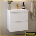 500mm wall hung vanity unit white gloss with drawers closed and brushed brass tap in modern bathroom setting showing internal storage