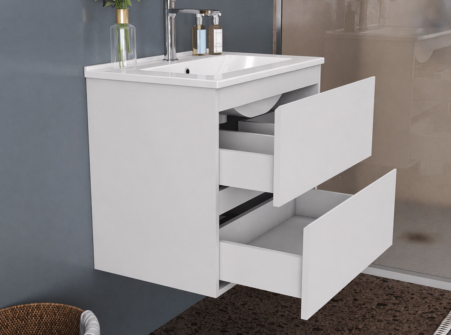 White bathroom vanity with open drawer against a gray wall