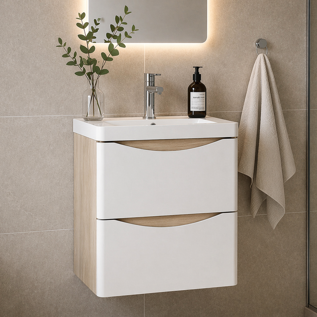 Wall hung bathroom vanity unit with white gloss drawers and oak side panels, modern basin with chrome tap under LED mirror in beige tiled bathroom