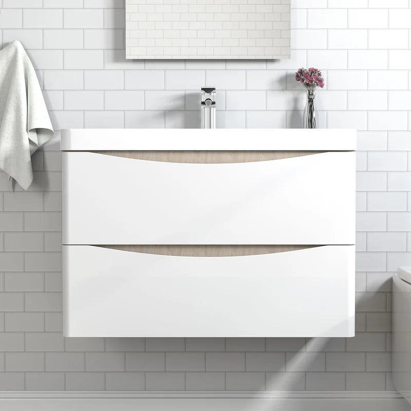 Front view of 800mm wall hung bathroom vanity unit with white gloss drawers and oak detail, modern basin and chrome tap on white tile wall