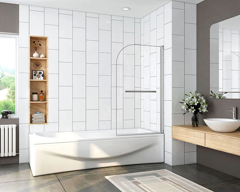 Curved bath shower screen fitted to white bath in modern bathroom with white tiled walls, wooden vanity and basin