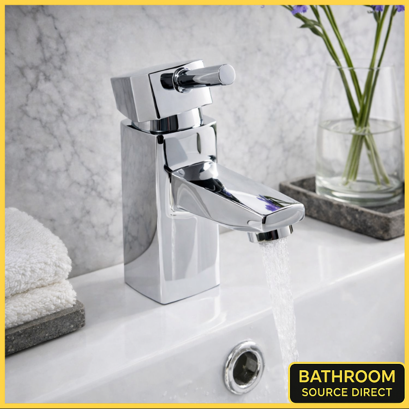 Formento Mini chrome mono basin mixer tap with push click waste installed on modern bathroom basin
