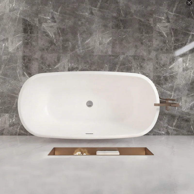 Top view of freestanding double ended bath showing spacious internal bathing area and central waste
