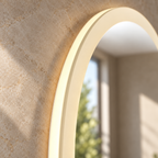 Close-up of the curved white acrylic edge and warm illumination on the K-LIGHT Burleigh LED mirror.