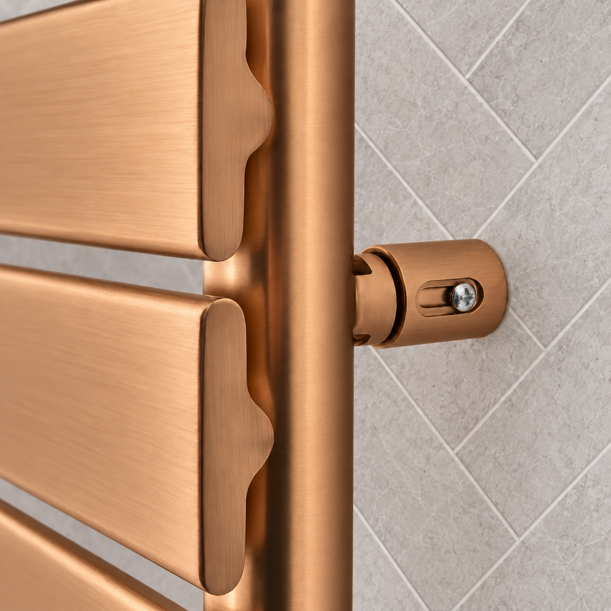 Close-up of the brushed bronze finish and wall bracket on the K-Rad Malibu towel rail