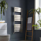 K-Rad Malibu brushed nickel designer towel rail on a dark bathroom wall