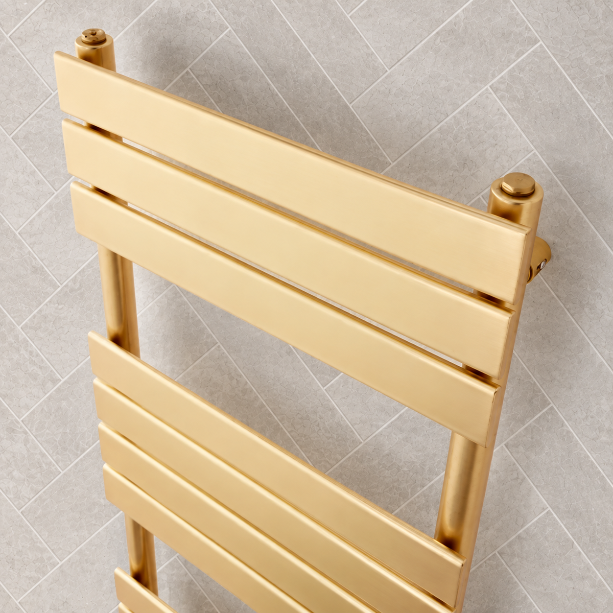 Angled view of the K-VIT Malibu brushed brass towel rail panels