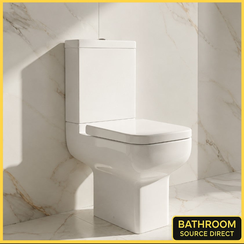 K Vit Options 550 close coupled toilet with soft close seat in a marble tiled bathroom