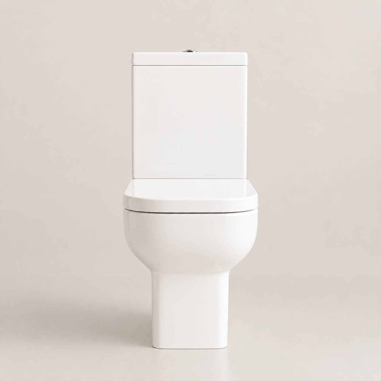 Front view of the K Vit Options 550 close coupled toilet with soft close seat