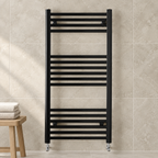 K-Warm black ladder towel rail in a modern bathroom setting