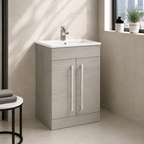 Kartell Purity 600mm floor standing vanity unit with ceramic basin in Silver Oak bathroom setting