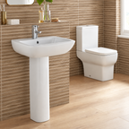 Kavara Korsika 4 piece bathroom suite with pedestal basin and close coupled toilet against wood-look tiles