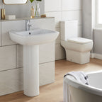 Korsika pedestal basin and close coupled toilet in a neutral bathroom
