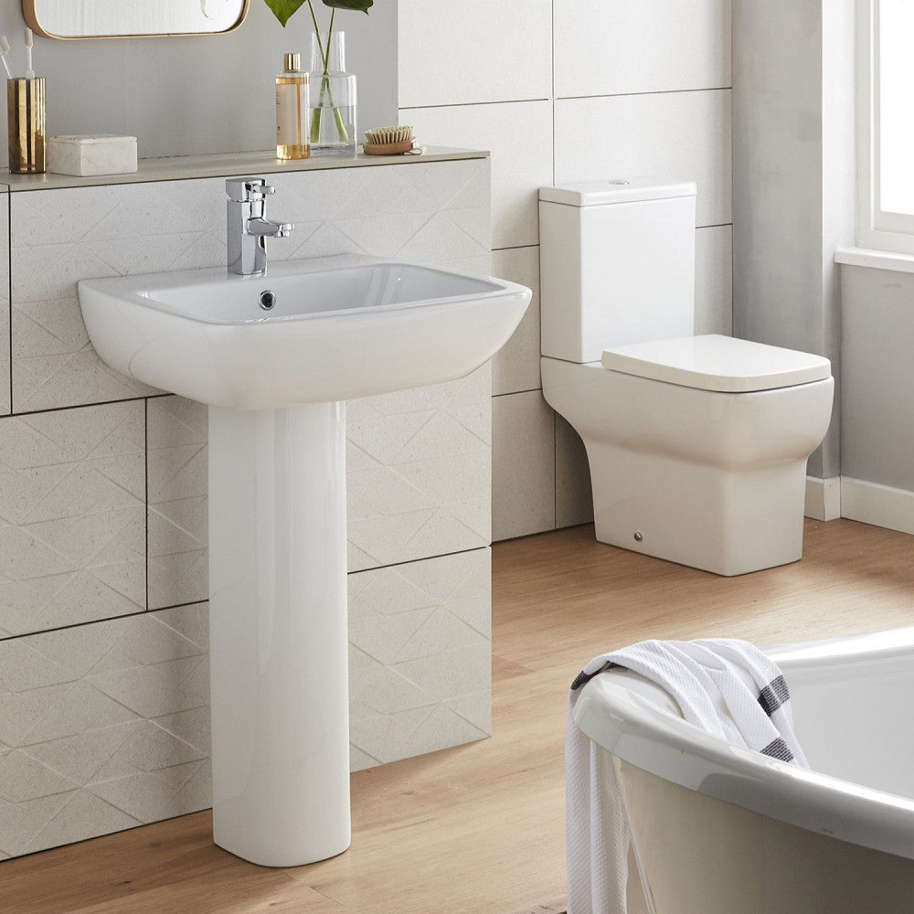 Korsika pedestal basin and close coupled toilet in a neutral bathroom