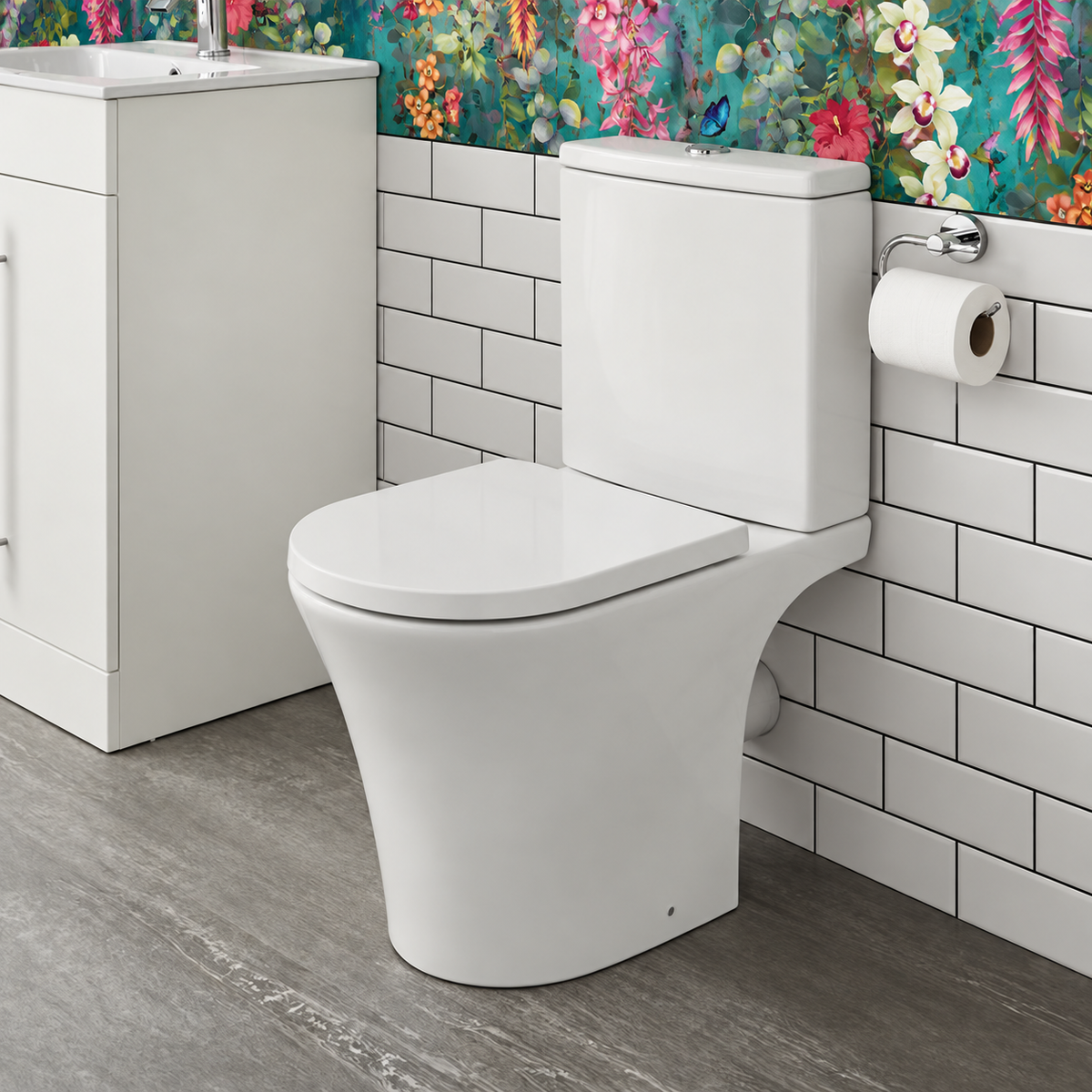 Kavera Kameo 640mm comfort height toilet with white metro tiles and floral wallpaper