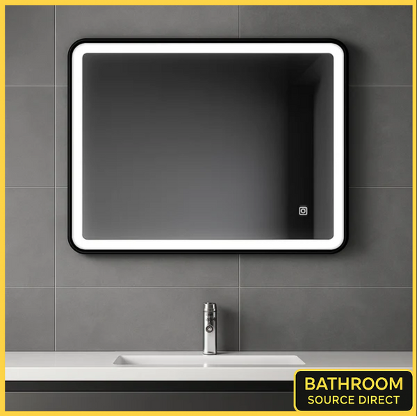 LumeEdgeLux 700 x 900mm black framed LED bathroom mirror installed above a modern basin