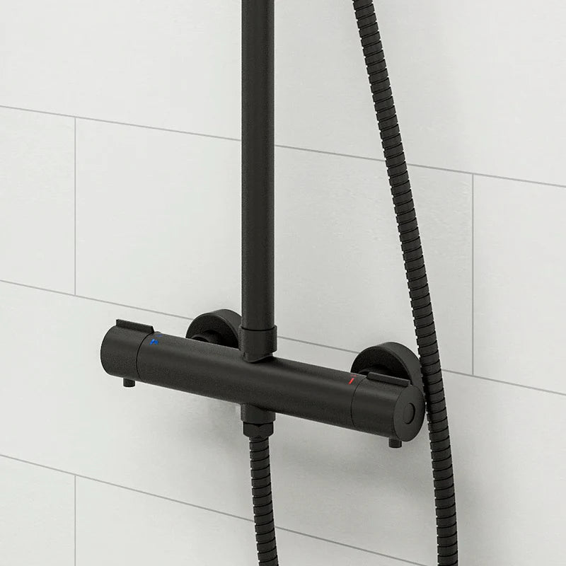 Thermostatic bar valve in matt black shower system with dual controls