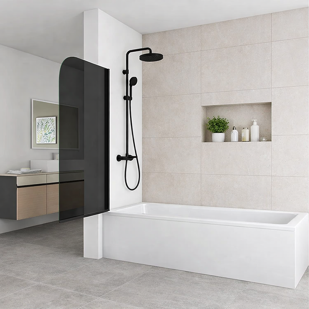 Mono black smoked pivot bath shower screen shown open with flat white bath panel, matte black shower and modern tiled wall with recessed niche and plant