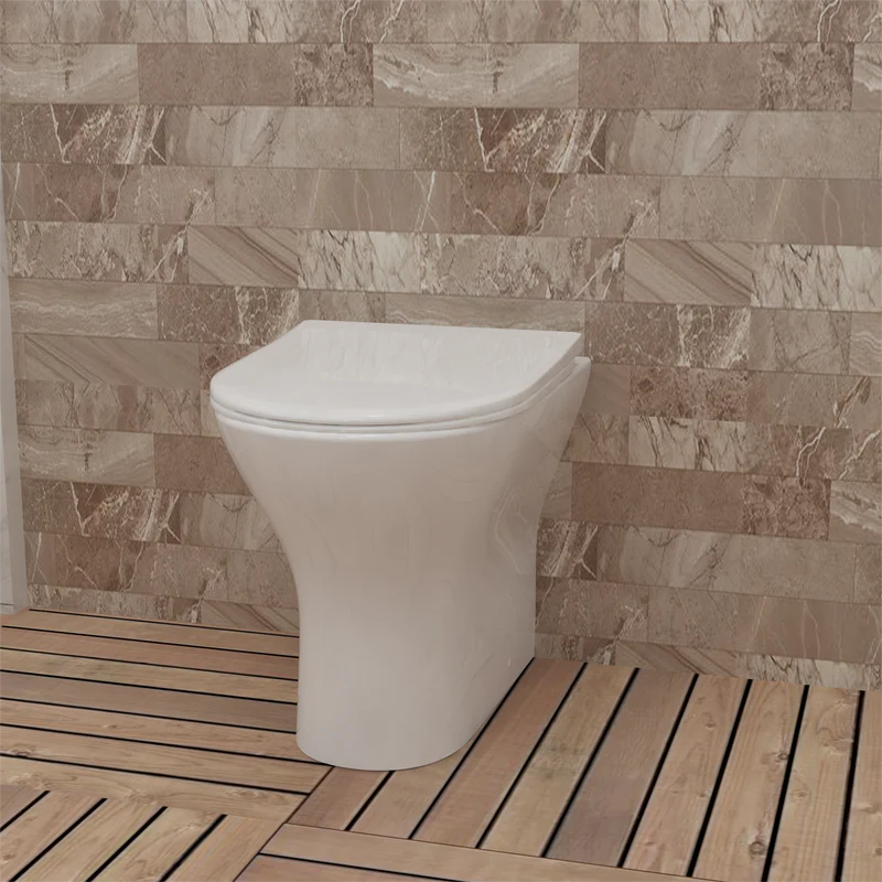 Oakham Chic back to wall toilet in modern tiled bathroom setting