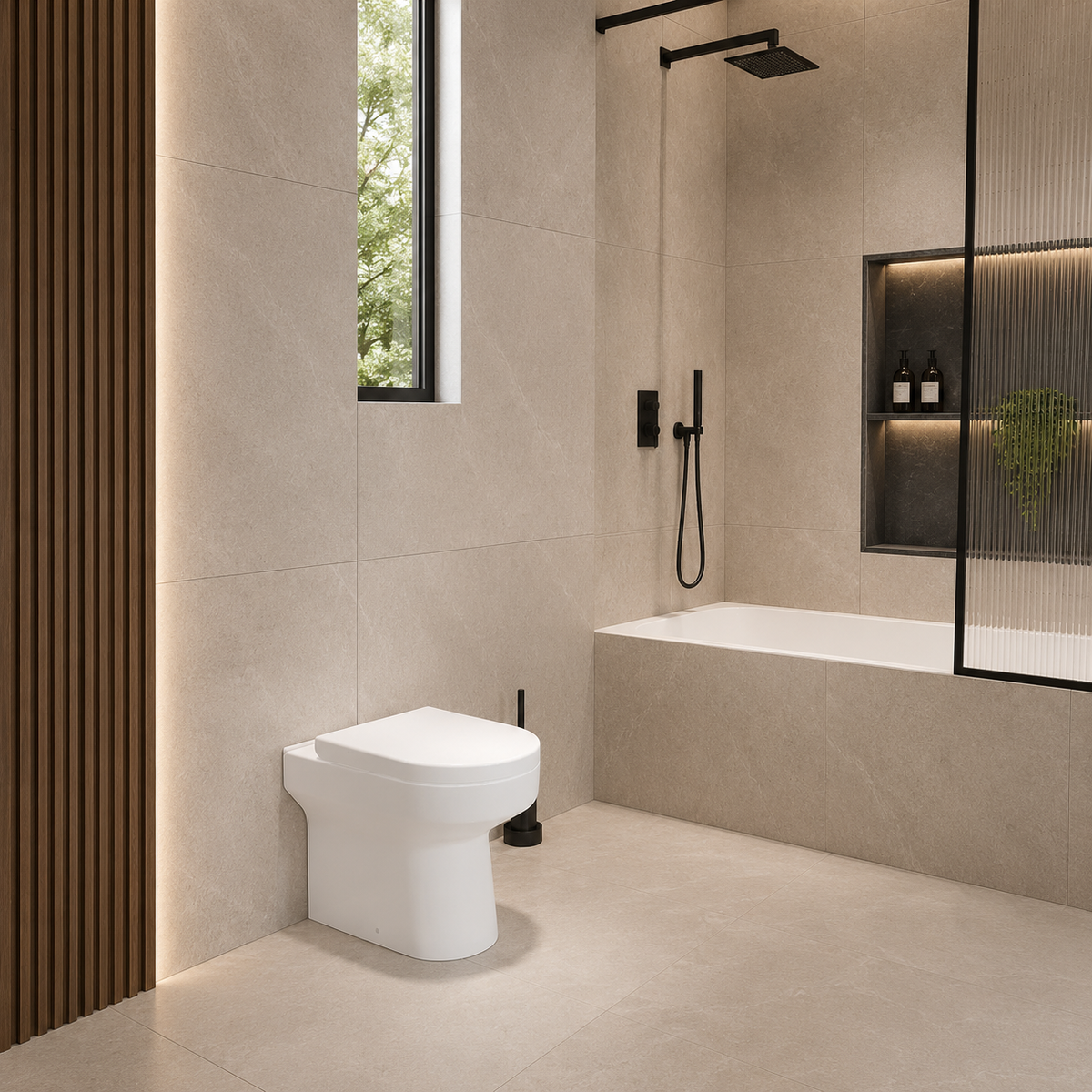Oakham D shape back to wall toilet installed in a spacious modern bathroom with a bath and window